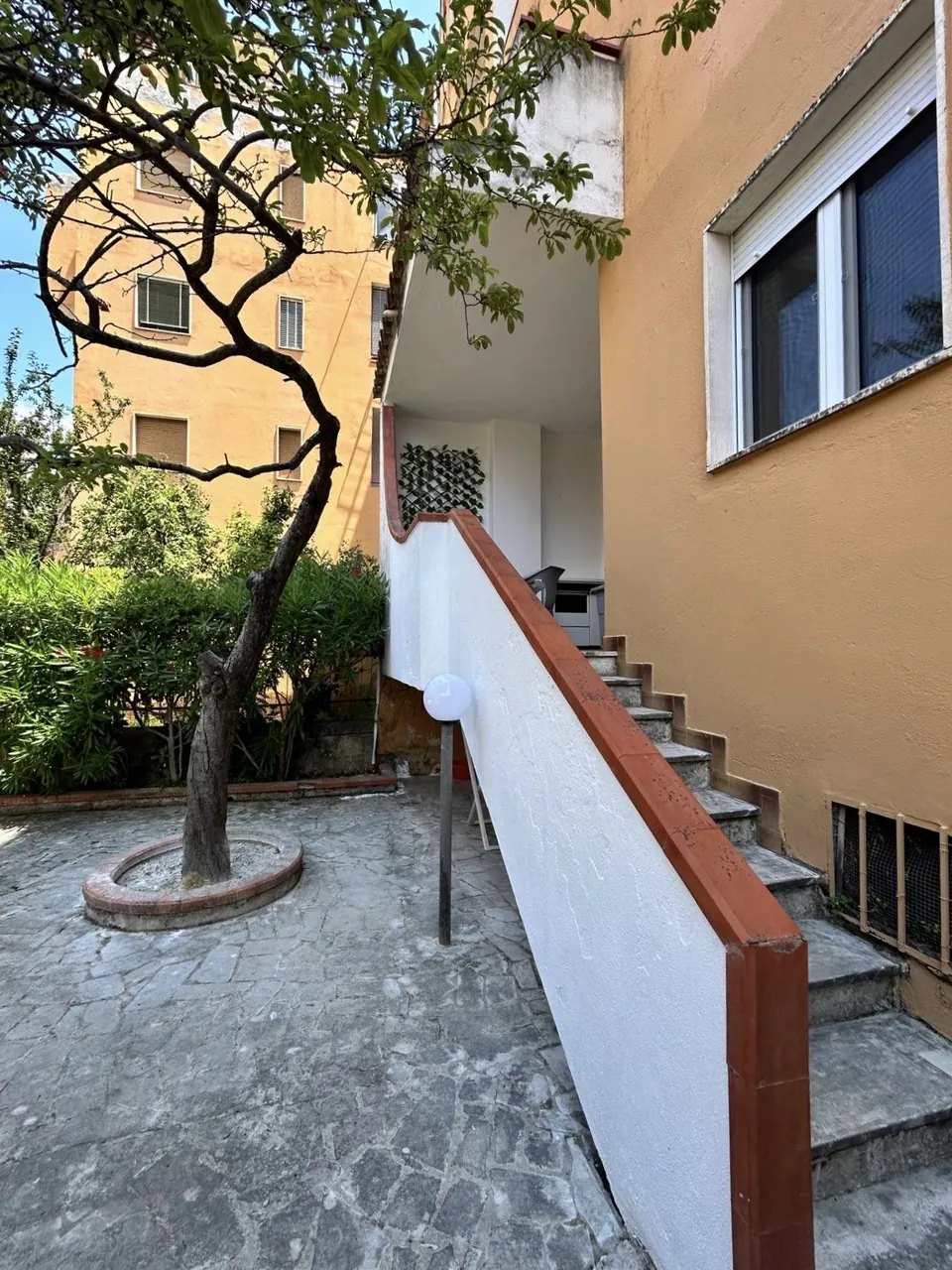 Steps from the garden up to the terrace