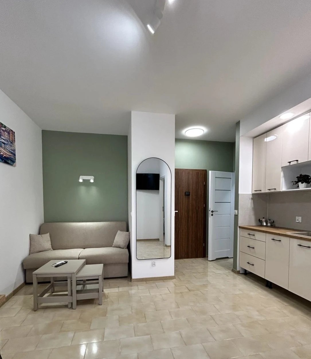 The kitchen with its wooden worktop, seen from the living room